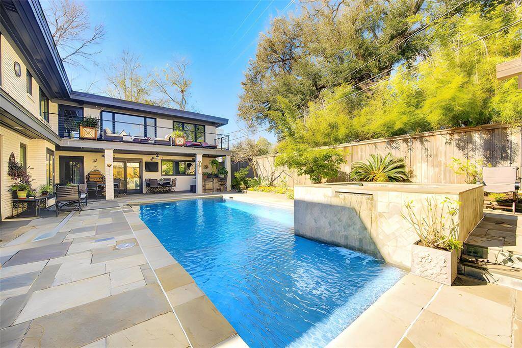 The outdoors are just as versatile as the inside with multiple seating and dining areas, access to the casita and outdoor kitchen all surrounded by mature landscaping including Meyer lemon trees and and grapefruit trees.