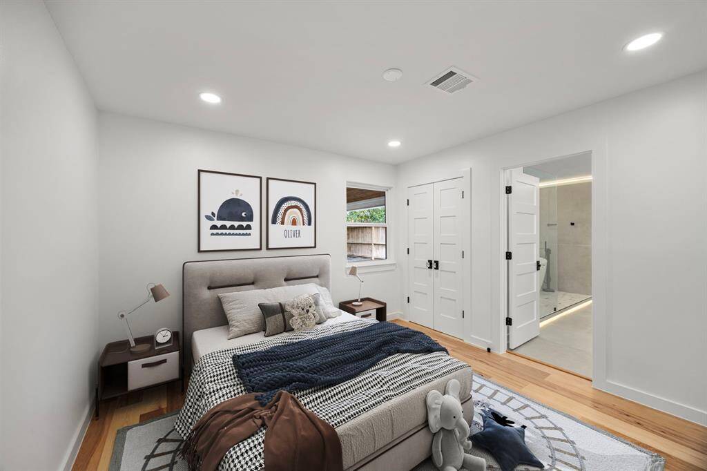 Rich wood flooring, high-quality windows, and solid wood doors create a warm and elegant shared space.