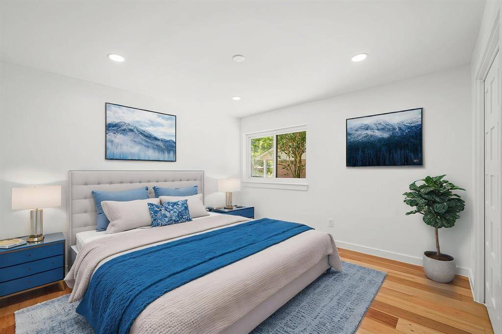 Thoughtfully designed with warm wood tones, natural light, and timeless craftsmanship, this bedroom is a haven of tranquility. Can also be an office suite.