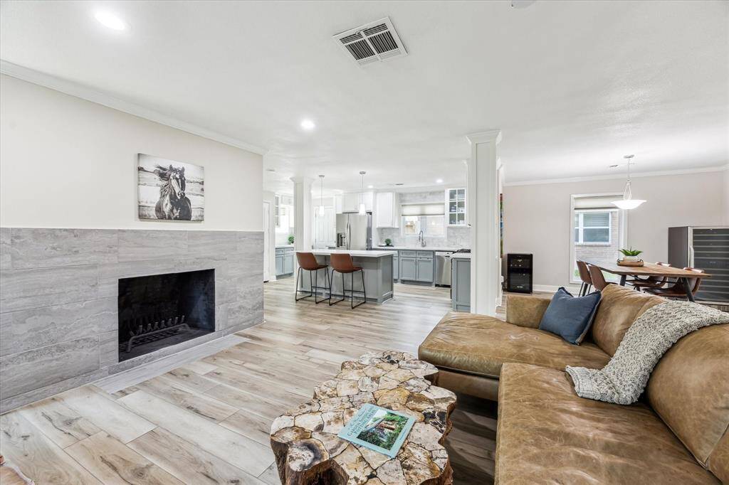 Effortlessly entertain in this spacious open-concept living area and kitchen,