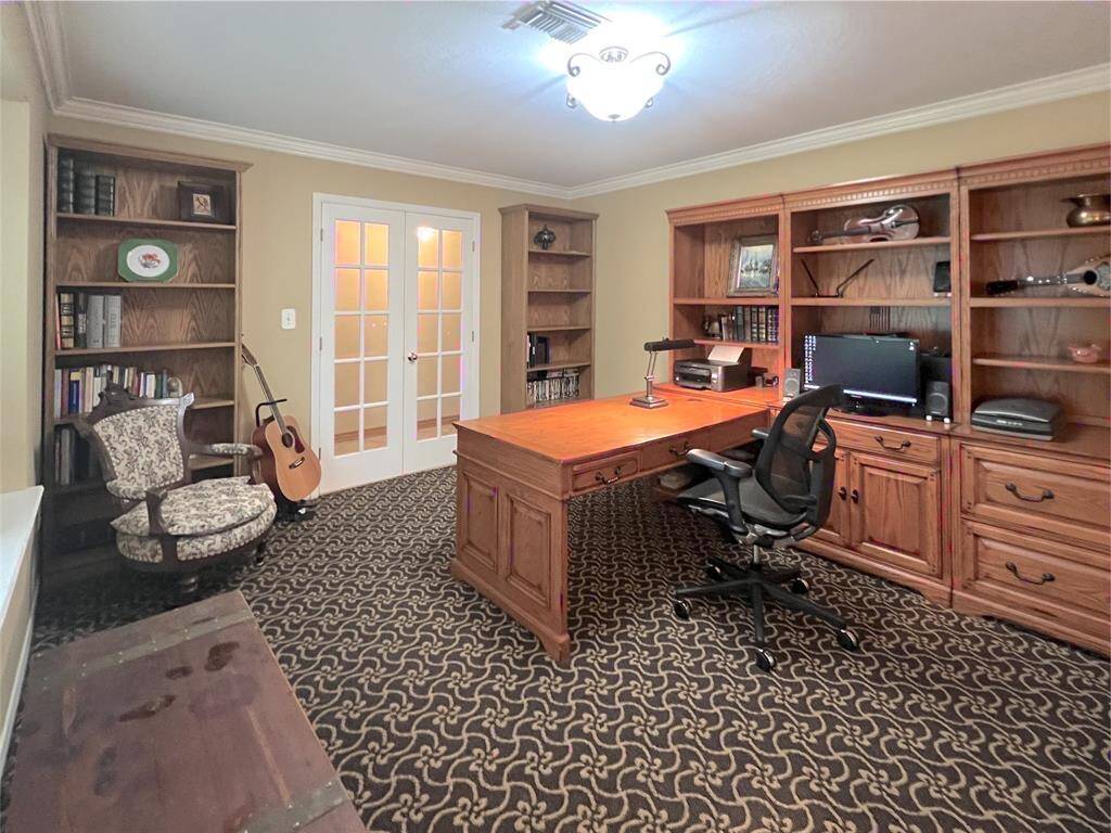 Study 15x12 with french doors that open to front entry