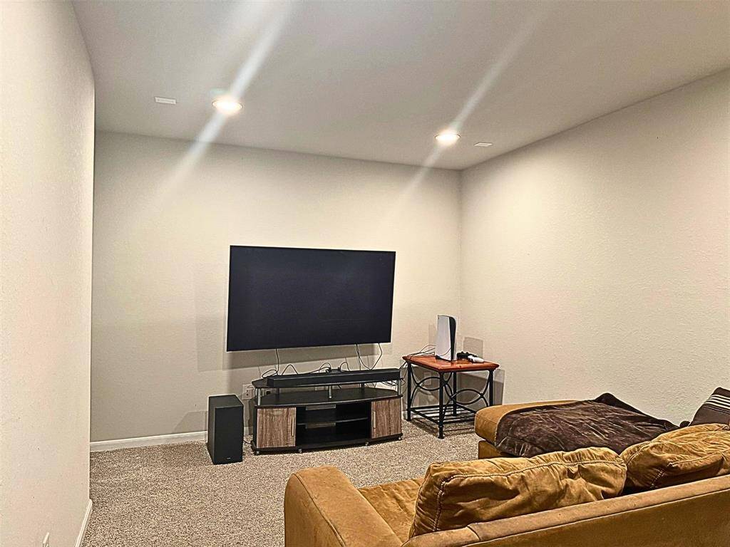 Cozy home theater room perfect for entertainment and relaxation.