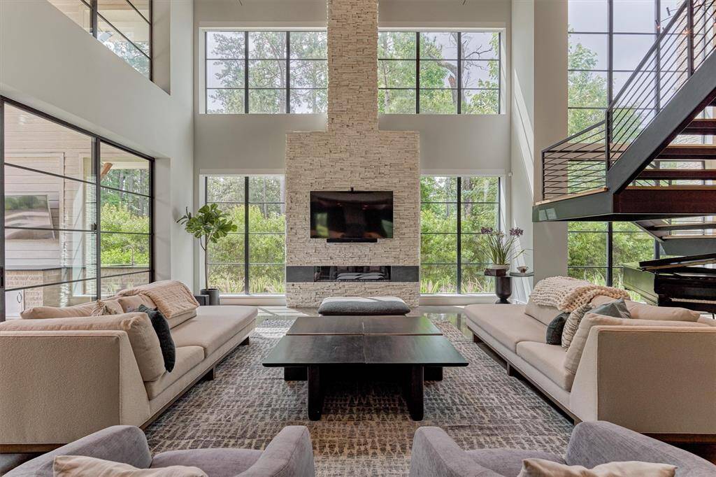 A seamless indoor-outdoor flow with 18-foot sliding doors connecting the great room to the back patio