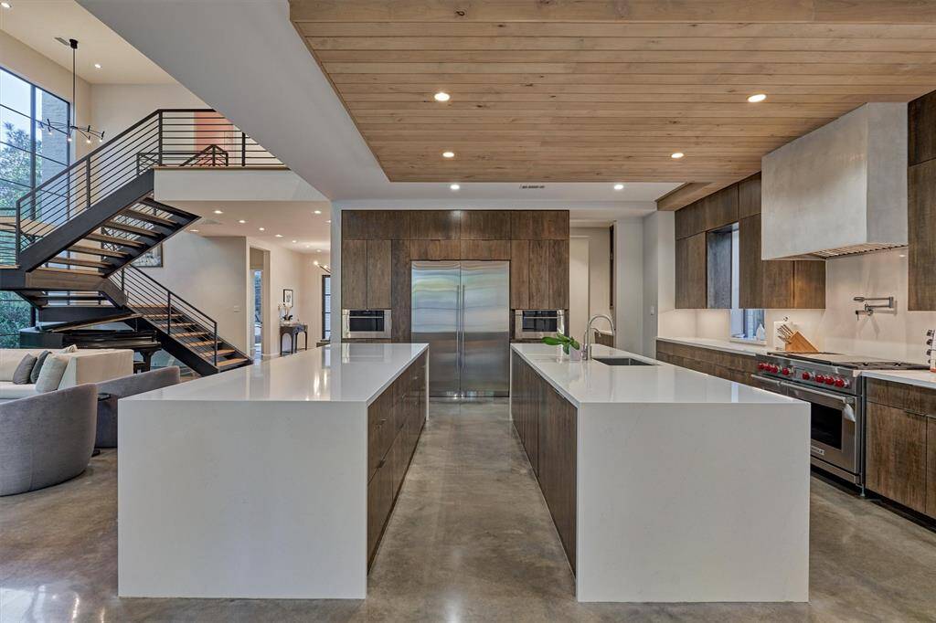 Abundant natural light and open sight lines make this kitchen the hub of the home