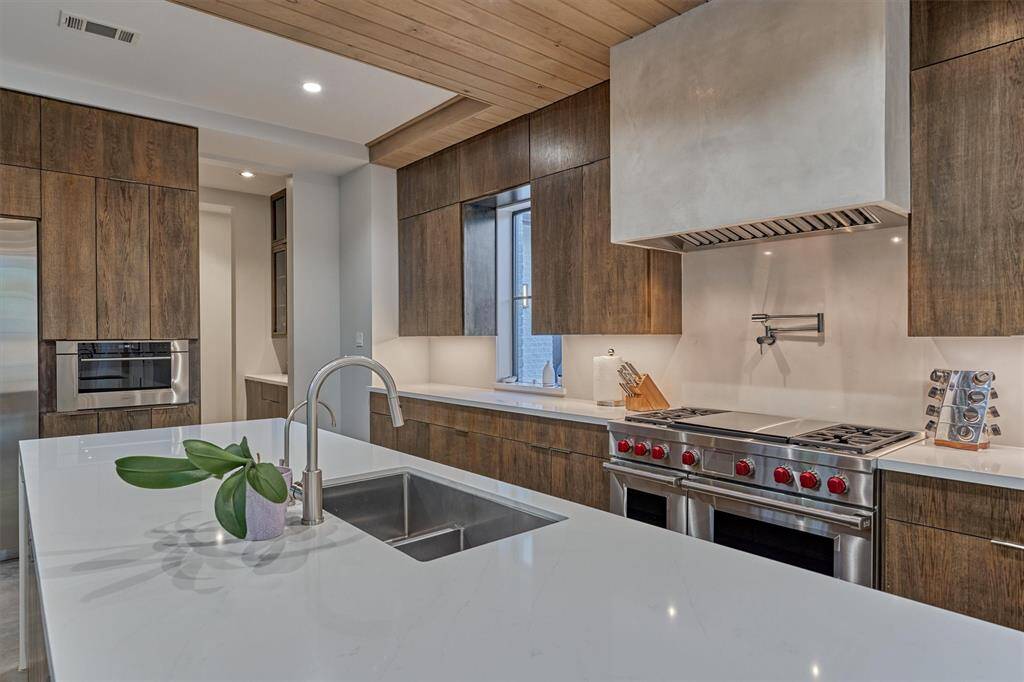 Functional luxury with two pantries, a reverse osmosis system, and built-in Wolf steam oven