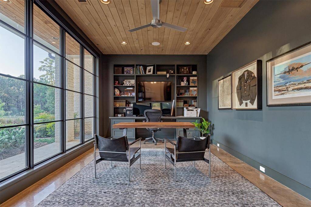 Bright and inviting home office with built-in audio and serene views