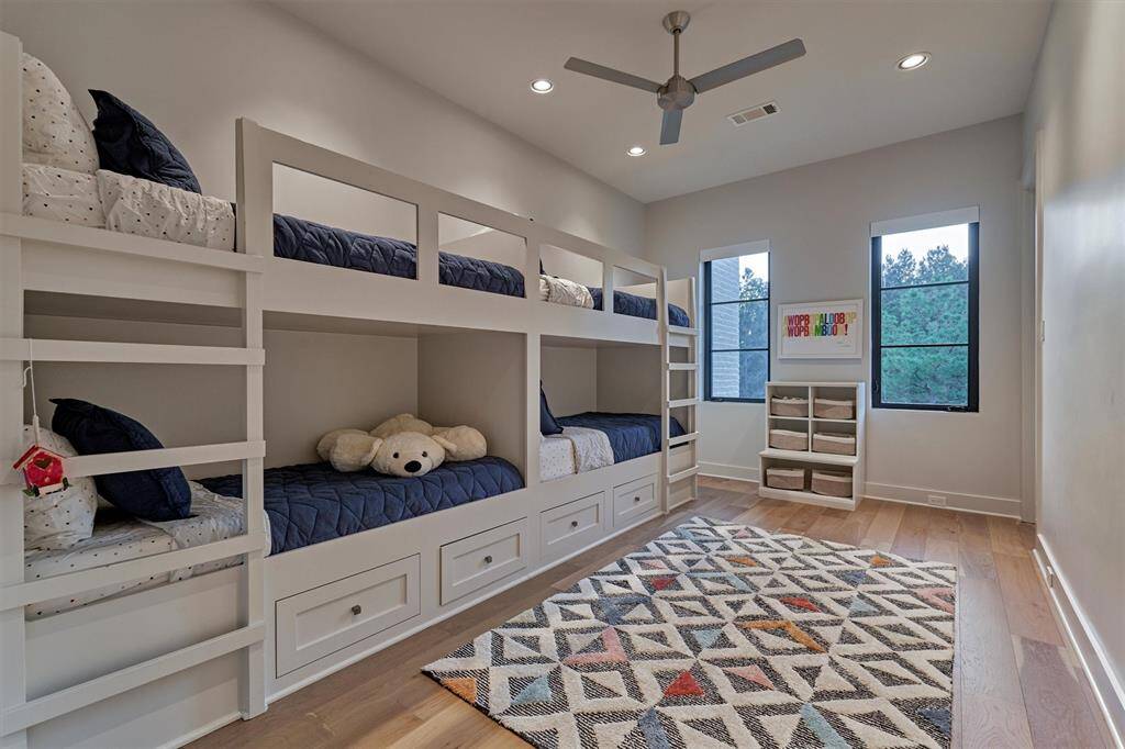 Bright and cozy space with wood flooring and easy access to upstairs amenities