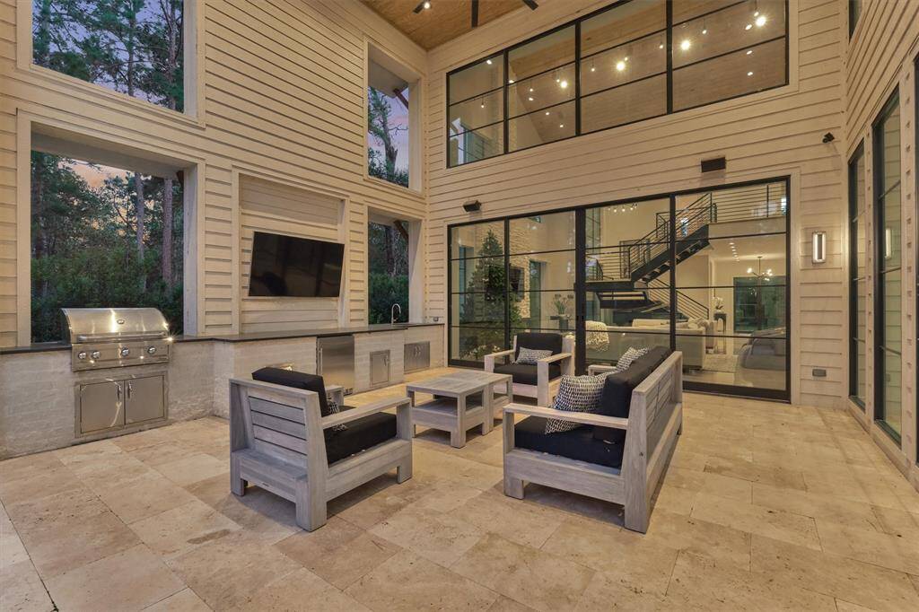 Covered patio with direct access to indoor living via sliding Western Window Systems doors