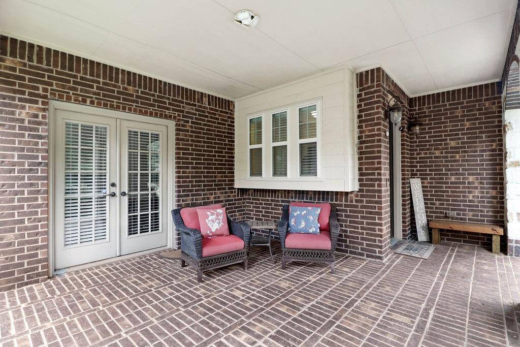 Front covered patio with direct access to home office