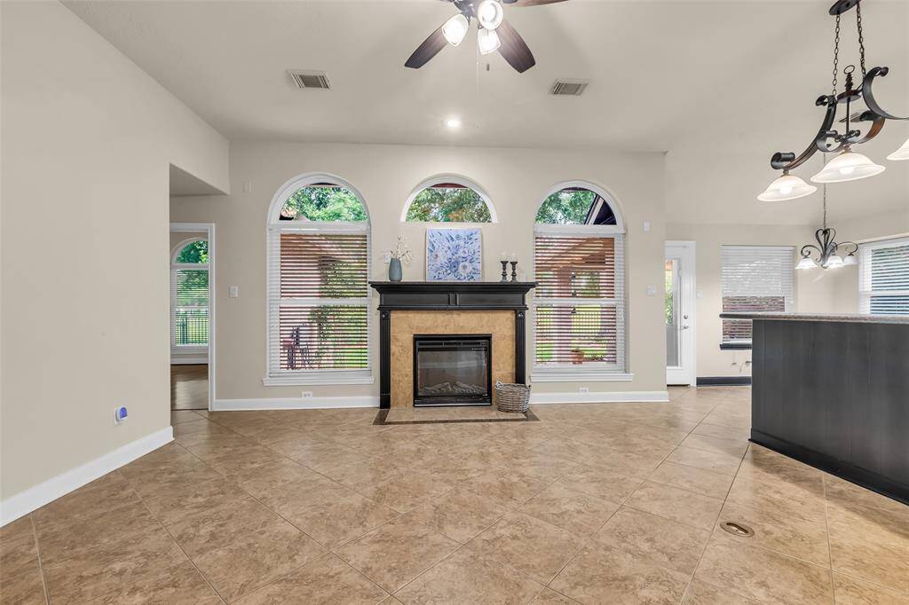The fireplace is the focal point of this great room.