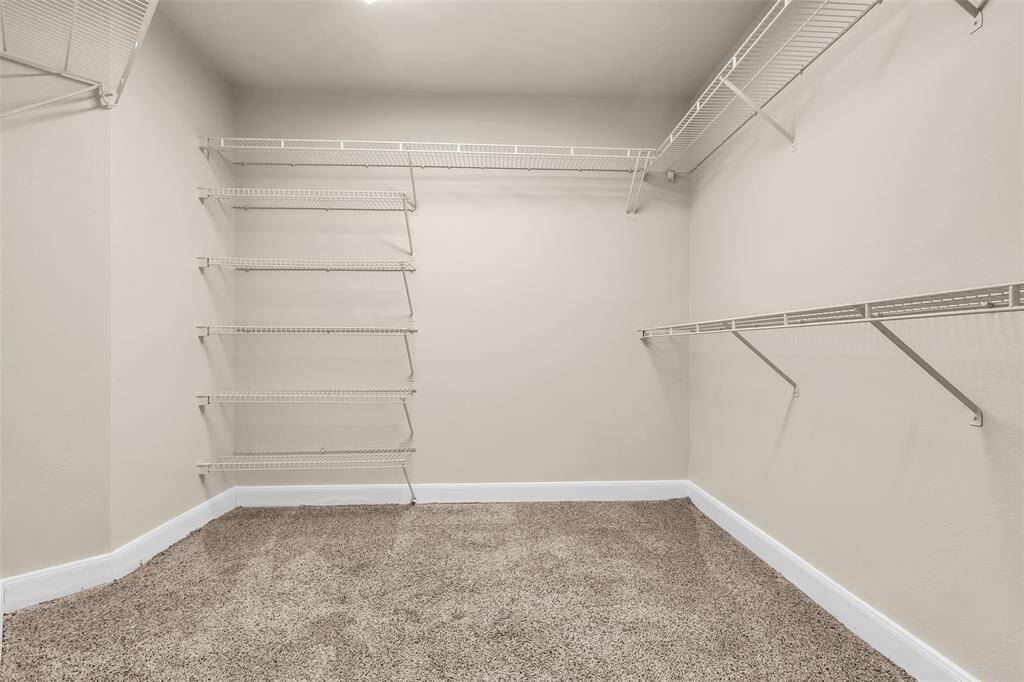 Don't miss the large primary walk-in closet.
