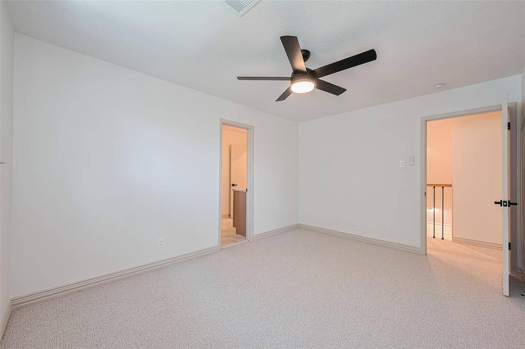 Upstairs 2nd of 3 rooms w/ ensuite remodeled full bath. The space is versatile, ideal for a bedroom or office. Fresh current paint colors and trim with brand new soft berber carpet makes for cozy guest bedroom your guests will be sure to love.