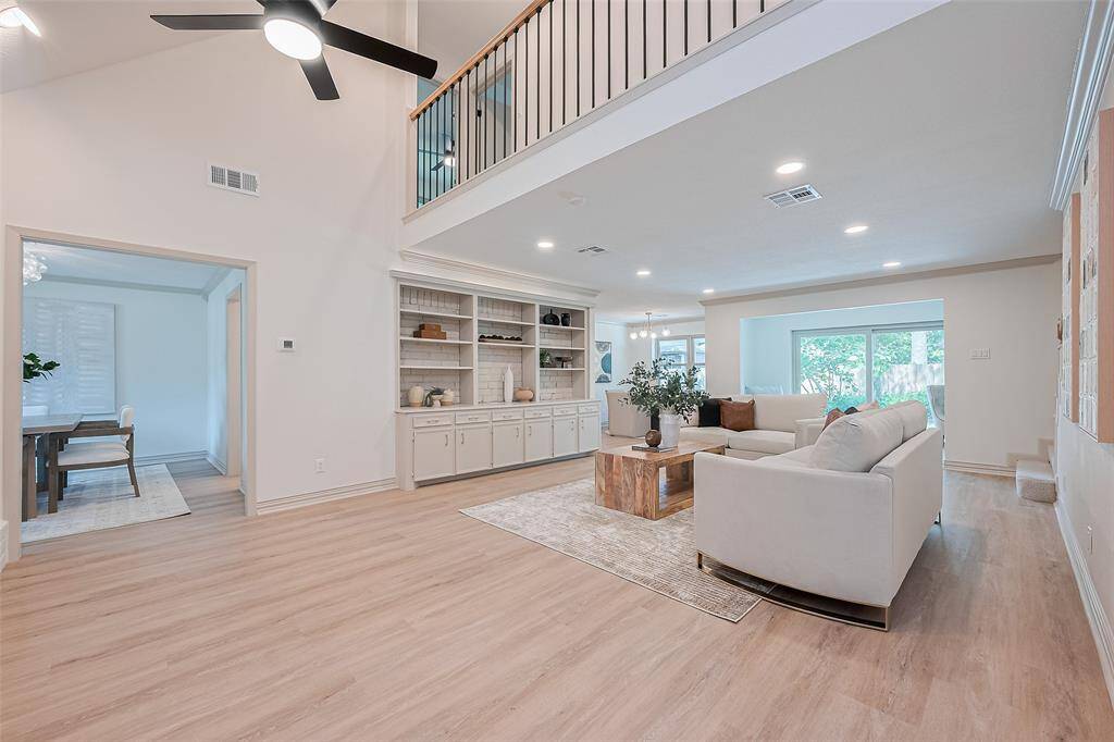 Imagine greeting your guests at this gorgeous home. Adjacent dining room and stylish features complete the inviting large open living space. Light and bright large windows, recessed lighting. Beautiful 2nd floor r
