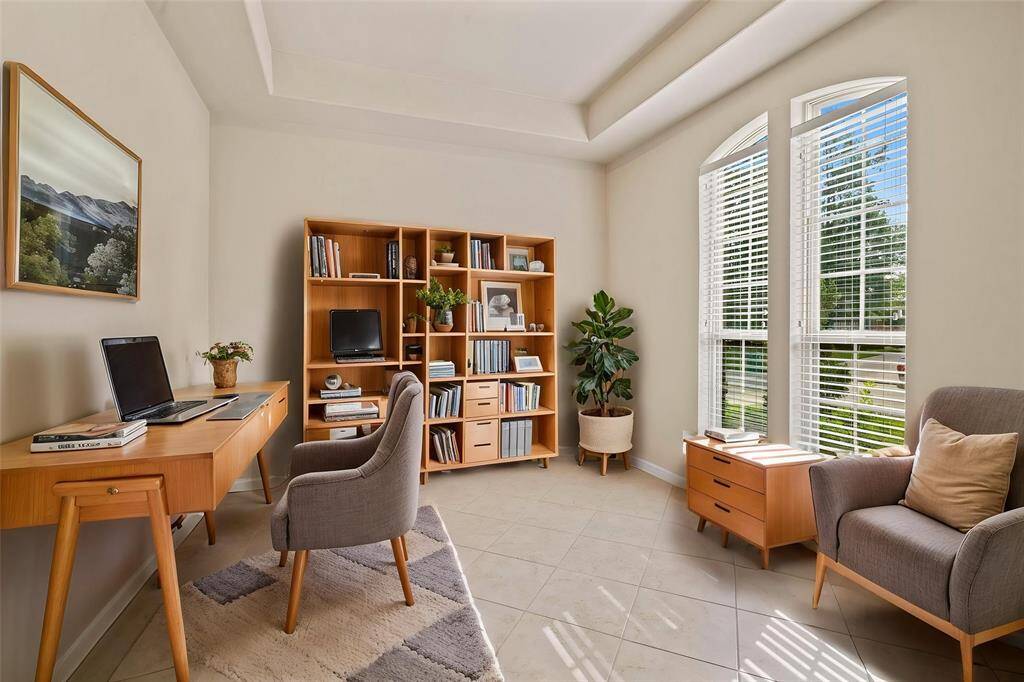 Bright office with expansive windows for abundant natural light.