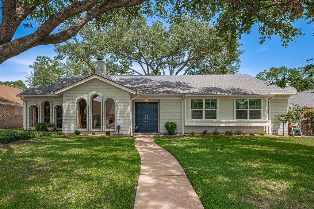 Welcome to this beautiful classic ranch style home with custom rounded windows, brick and wood exterior - with roof in 2019!