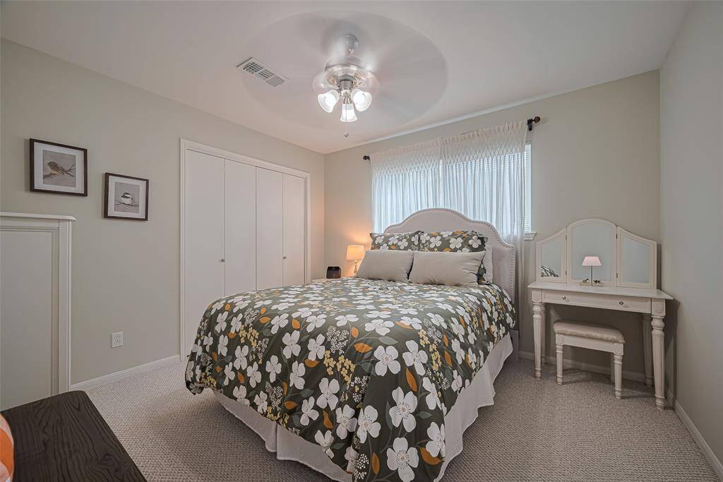 Second bedroom is cozy and warm with double closet and berber carpet