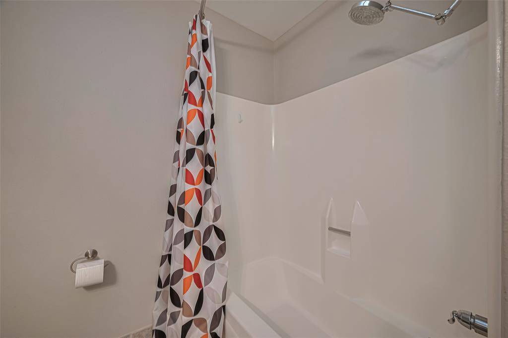 Main bath with tub surround shower combination