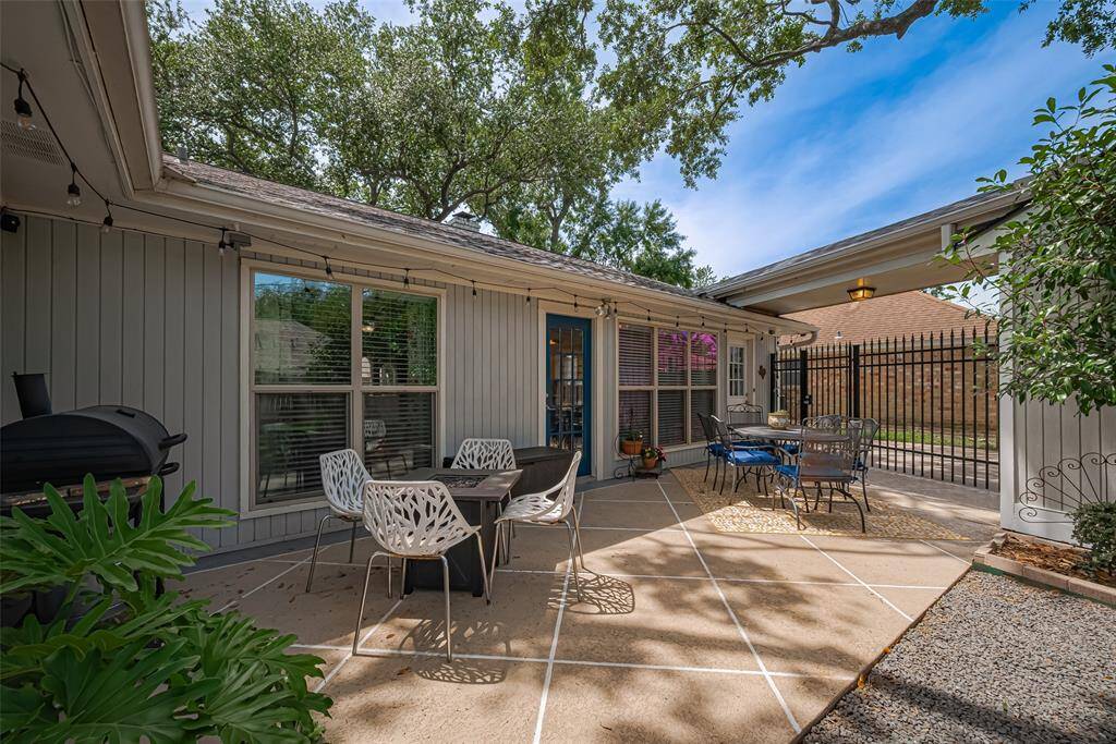 The view from your breakfast area and living space. Relax and entertain on your extended back patio. The home has leaf lock gutter system and a french drain