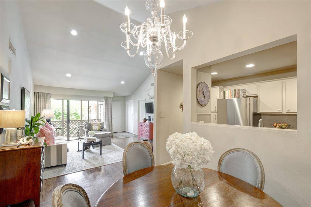 Open-concept living and dining rooms with pass through to the kitchen is great for entertaining.