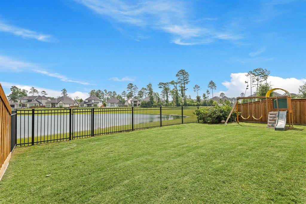 Breathtaking views of the sparkling lake from your private, fully fenced backyard.