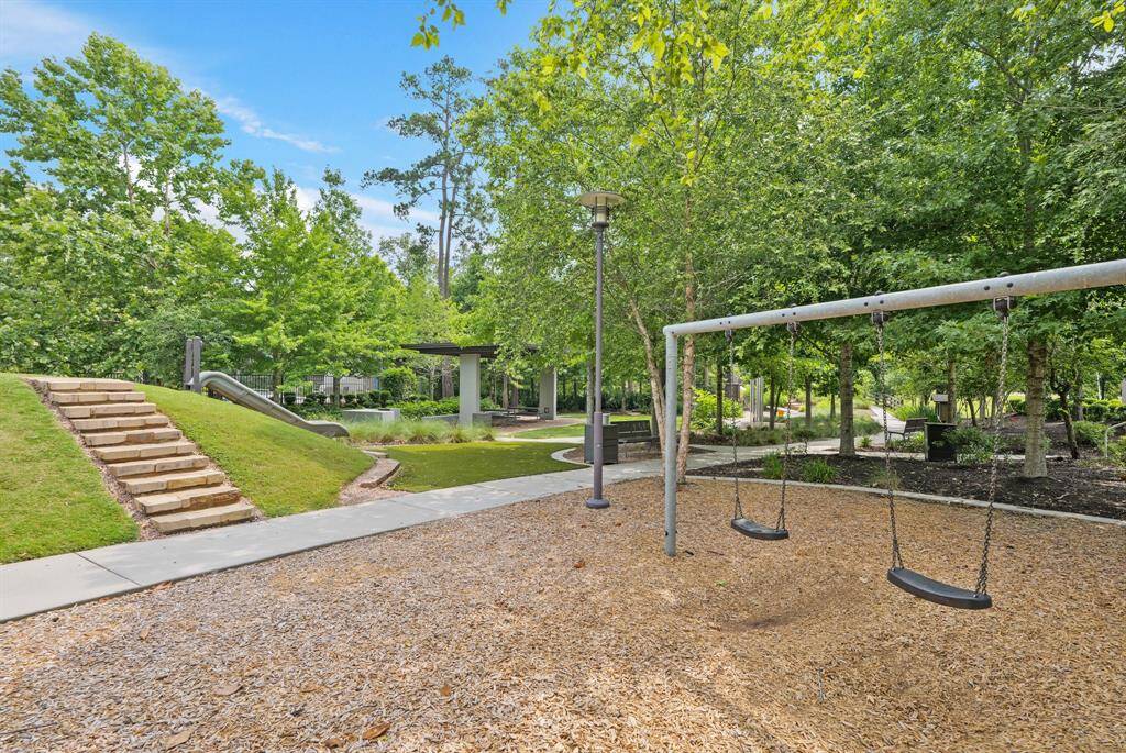 Enjoy peaceful walks and outdoor fun at the neighborhood park featuring scenic paths, mature trees, and a playground with swings.