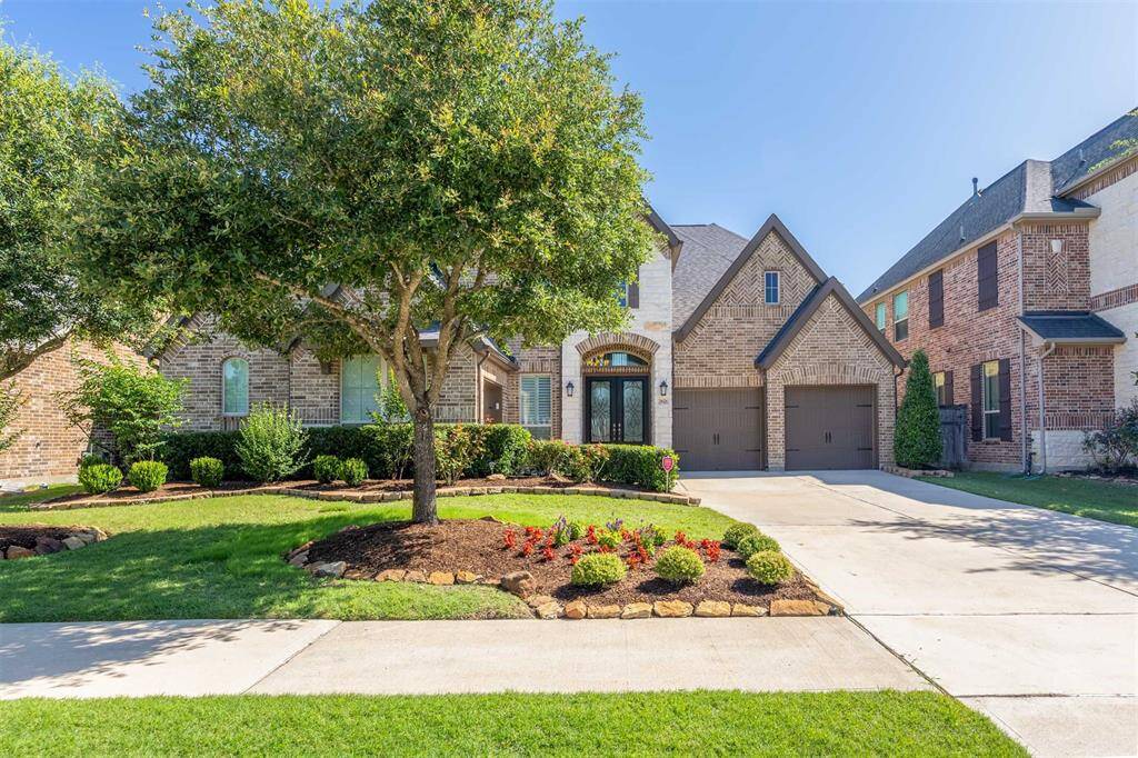 Gorgeous tile flooring extends from the back of the home to create a low-maintenance, high-style outdoor escape. Covered and uncovered areas provide flexibility for lounging or entertaining under the Texas sky.