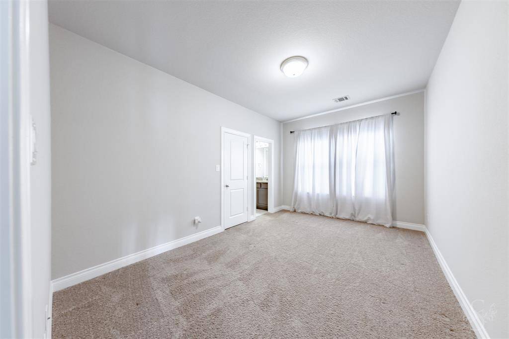 Another generously sized upstairs bedroom, complete with an en-suite bath and a peaceful ambiance. Ideal for guests, teens, or a private office suite.