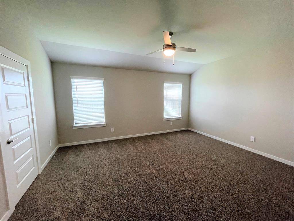 Spacious main bedroom with tons of natural light.
