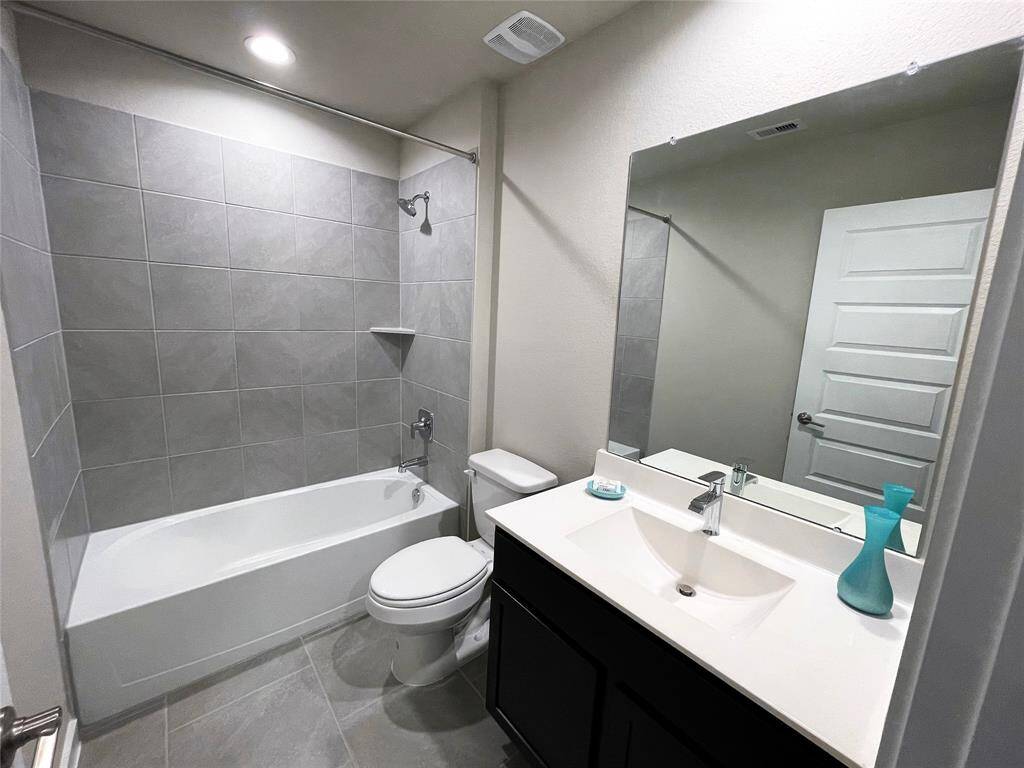 Bathroom three servicing bedrooms three and four.