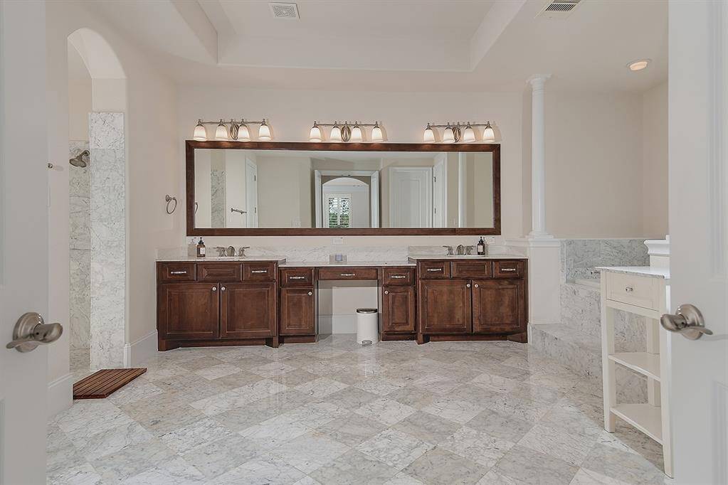 Opulet Carrera marble impresses in the primary bathroom