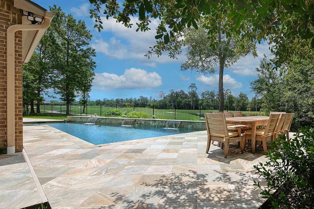 Unparalleled golf and water views from nearly every room of the home