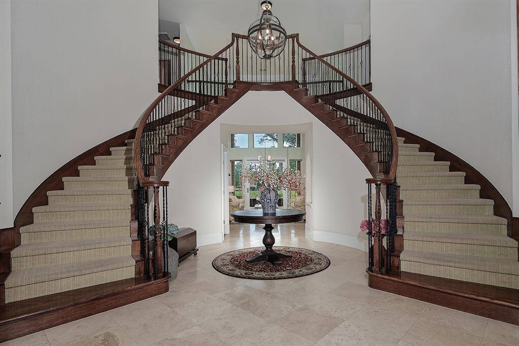 Grand foyer with dual staircases