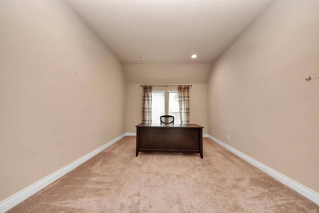 There is a study with French doors, perfect for working from home or reading