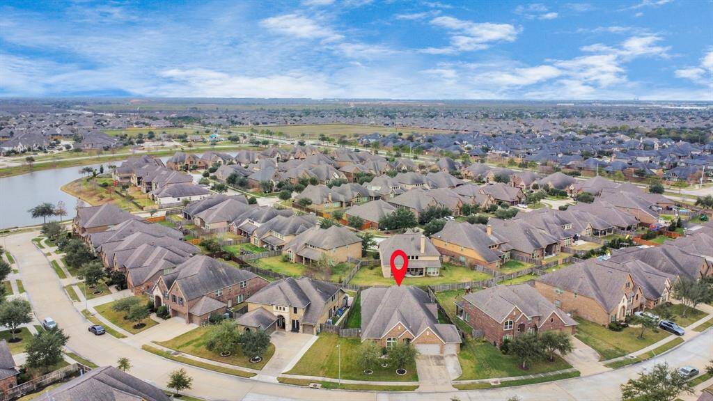 The home is in a lovely neighborhood, just a minute’s walk from walking trails with lake views