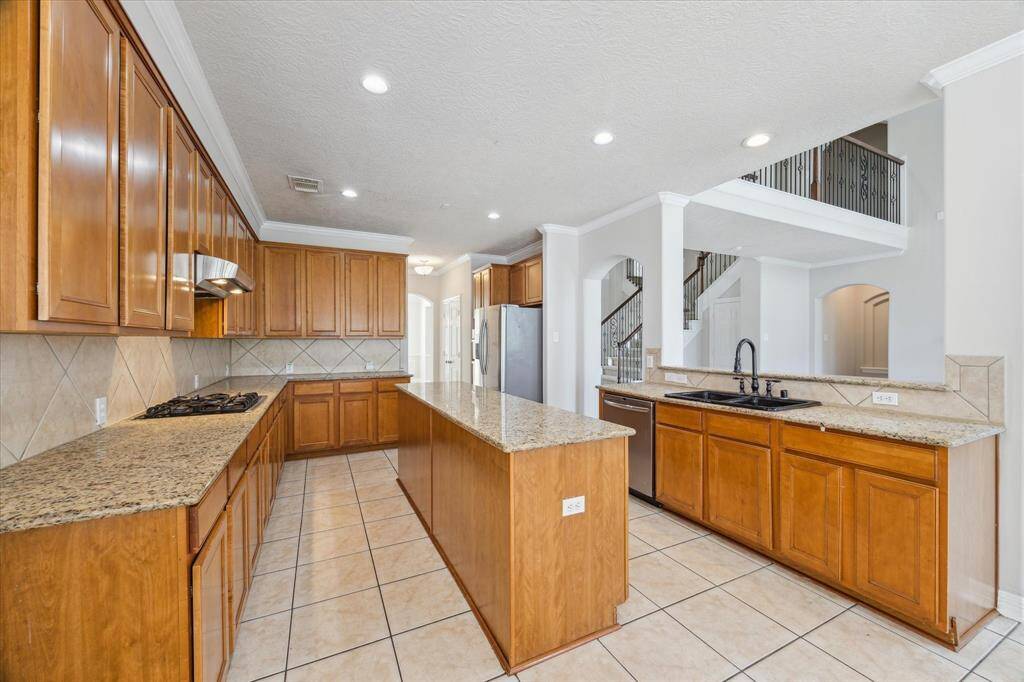 The chef in your family will love the open layout design of this space.