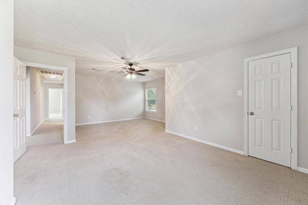Another view of this large bedroom showcases the amazing space. So much room for your imagination to run wild.