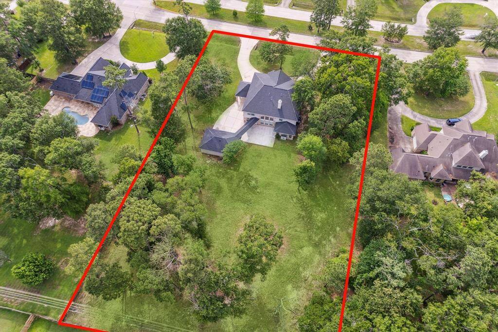 You will love this gorgeous home on a wooden lot.