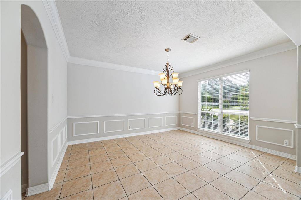 To the right upon entry of the home sits a formal dining room with plenty of space for entertaining.