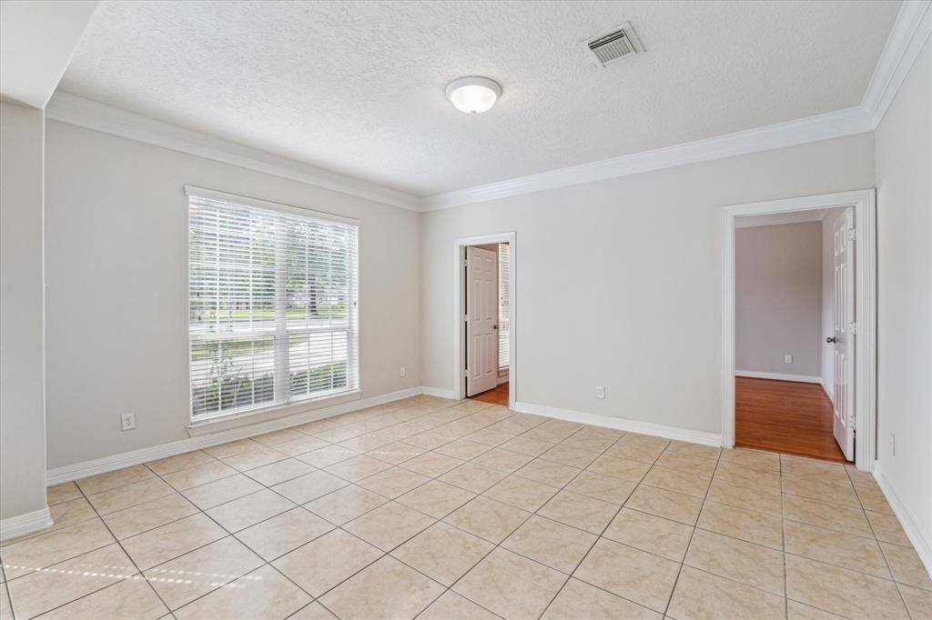 Across the formal dining room is the formal living