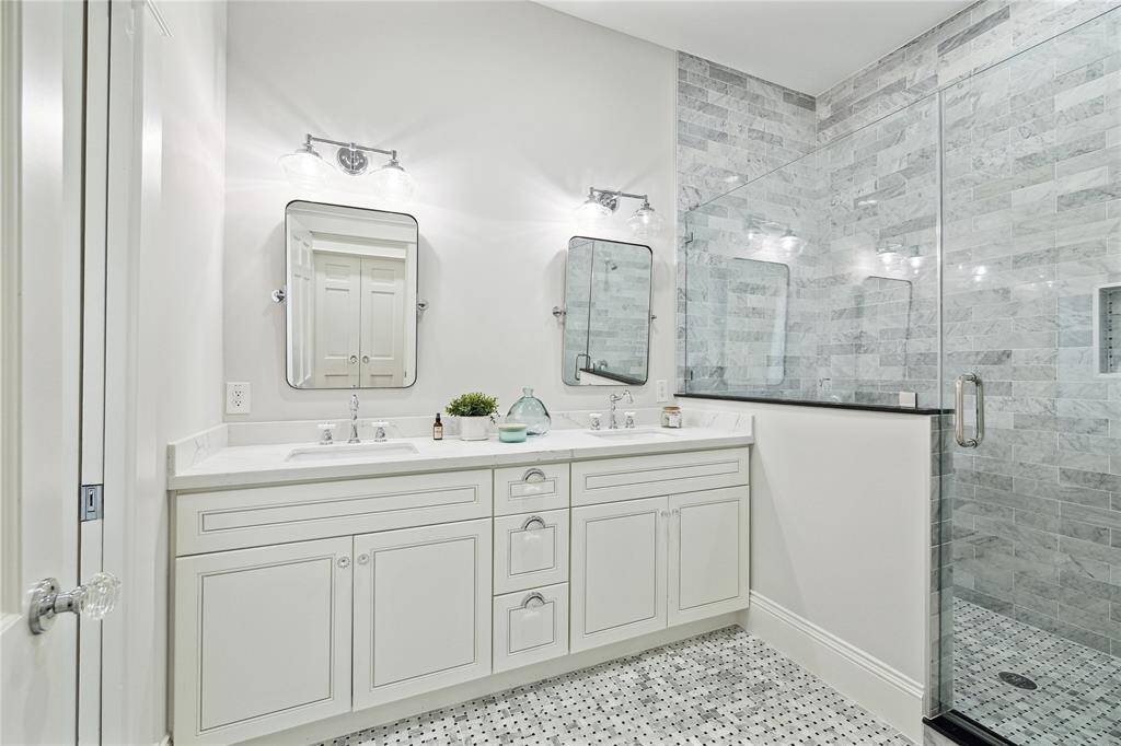 Luxurious Primary bath with double vanity, water closet and...