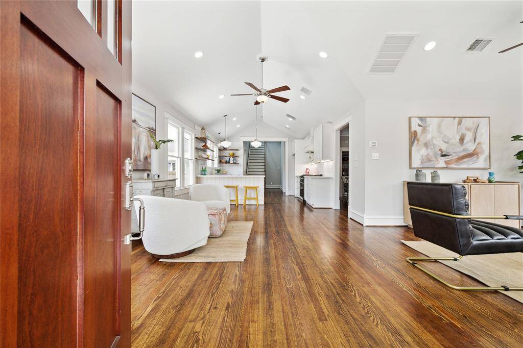 WELCOME HOME to a beautiful light-filled historic home in the heart of the Houston Heights!