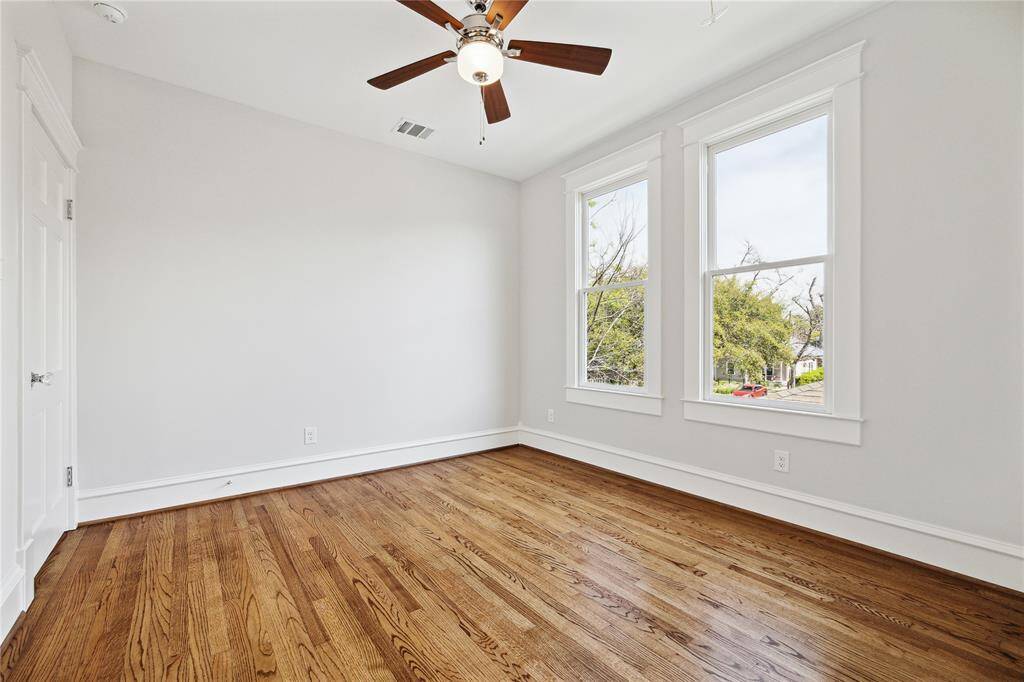 Another view of the secondary guest suite with door to upstairs landing closed.
