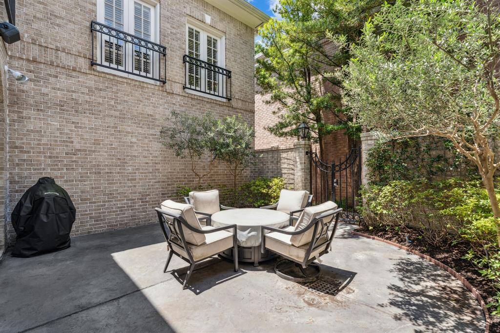 Large patio area perfect for outdoor dining and relaxation.