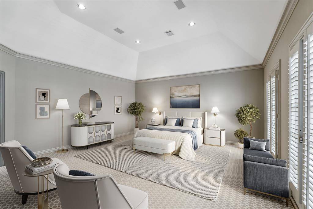 Luxurious Primary Bedroom  (19 x 18) with gambrel ceiling and plush carpeting. This photo is virtually staged to show one possible configuration of furniture. The Primary Bedroom is pure retreat-mode: oversized and sunlit with crown molding, Juliet balconies, and plenty of room for a cozy sitting area or even a morning yoga flow.
