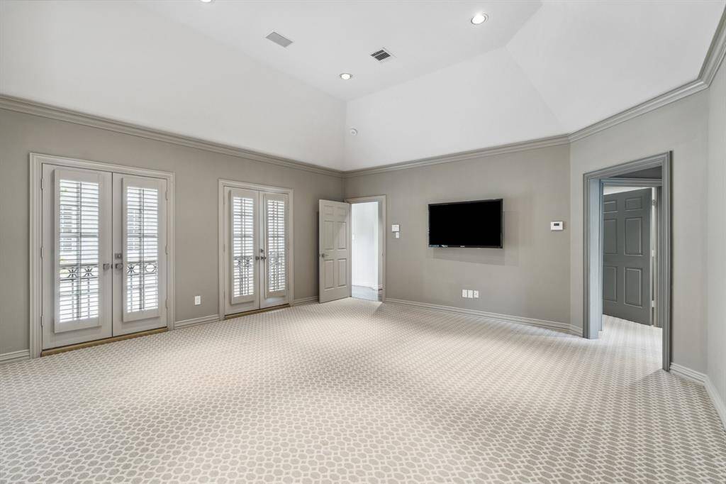 A view of the Primary Bedroom (19 x 18)-a sanctuary with room to breathe and unwind. In addition to the Primary Bedroom, the Primary suite includes a closet fit for royalty, a Study/sitting room or Closet #2 and a spa inspired bath.