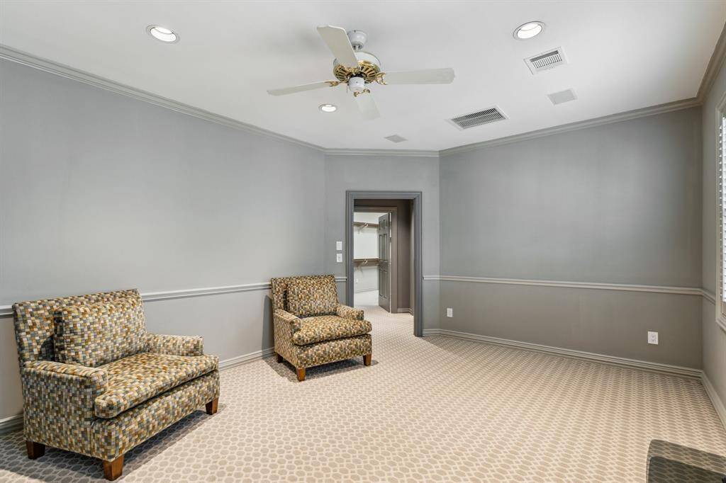 This Bonus Room in the Primary Suite could be a second walk in closet or Media room designed for entertainment with surround sound setup.