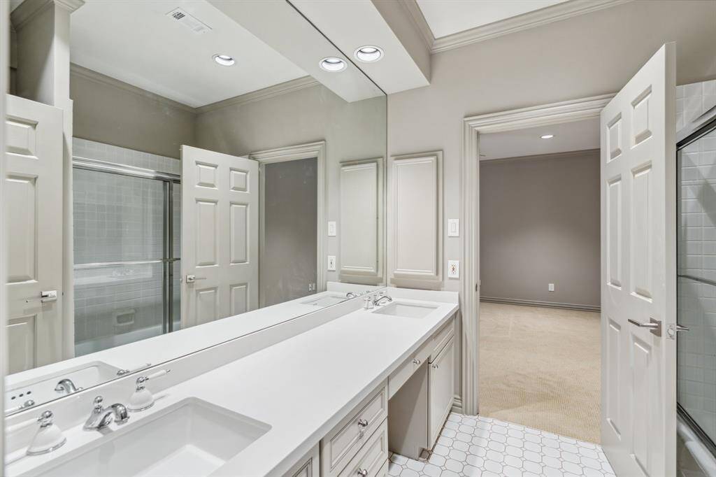 Hollywood Bathroom updated (2023) and equipped with modern fixtures, recent counter with undermount lavatories and tile flooring. This full bath has charm and function—polished surfaces, soft tones, and a layout that maximizes every inch. It’s ideal for sharing or solo use without feeling cramped. Paint 2025.