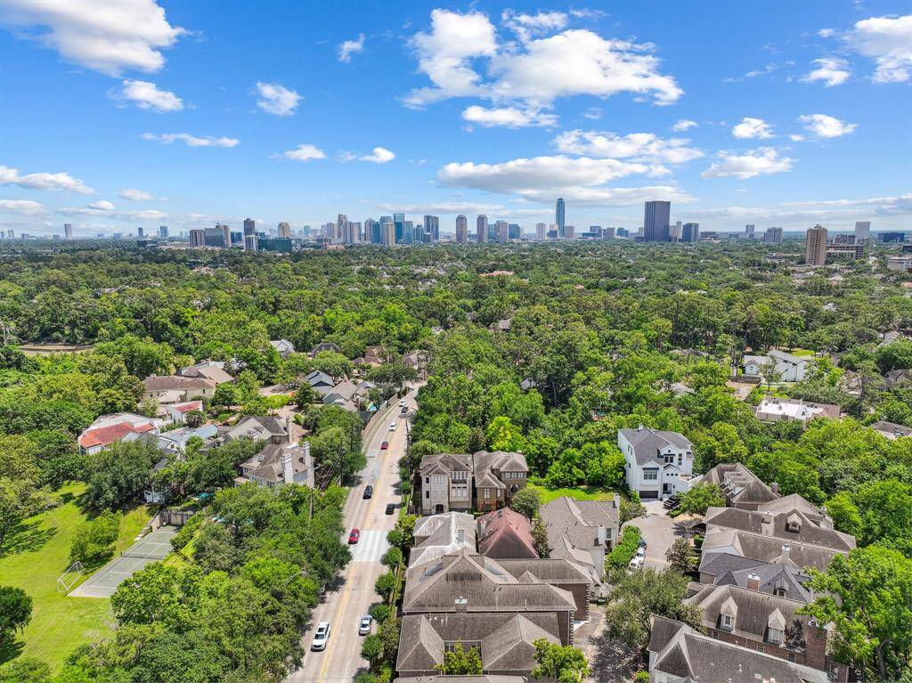Another stunning aerial, this time zooming in a little closer to highlight the home’s symmetry, rooflines, and that gorgeous backyard hideaway you can’t wait to explore. All this and zoned to highly acclaimed Spring Branch ISD schools: Hunters Creek Elementary, Spring Branch Middle and Memorial High School. the triple crown of schools.