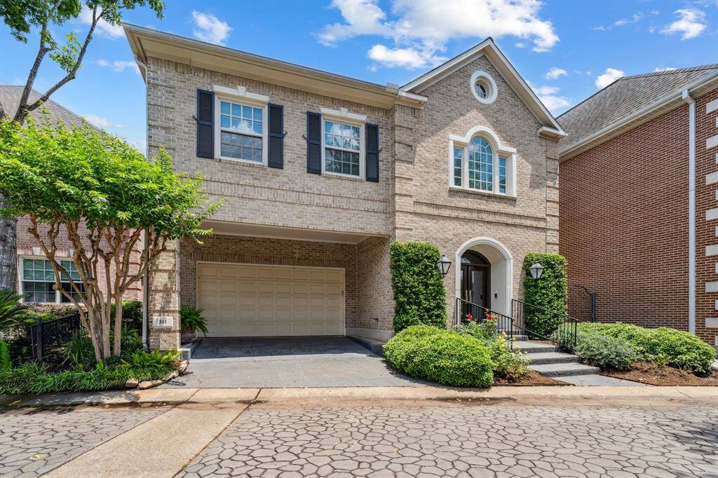 Welcome to 311 Indian Bayou in the Tanglewood area controlled access community of 17-homes known as Indian Bayou.  Timeless traditional architectural elements grace this 3 bedroom, 2.5 bath residence.