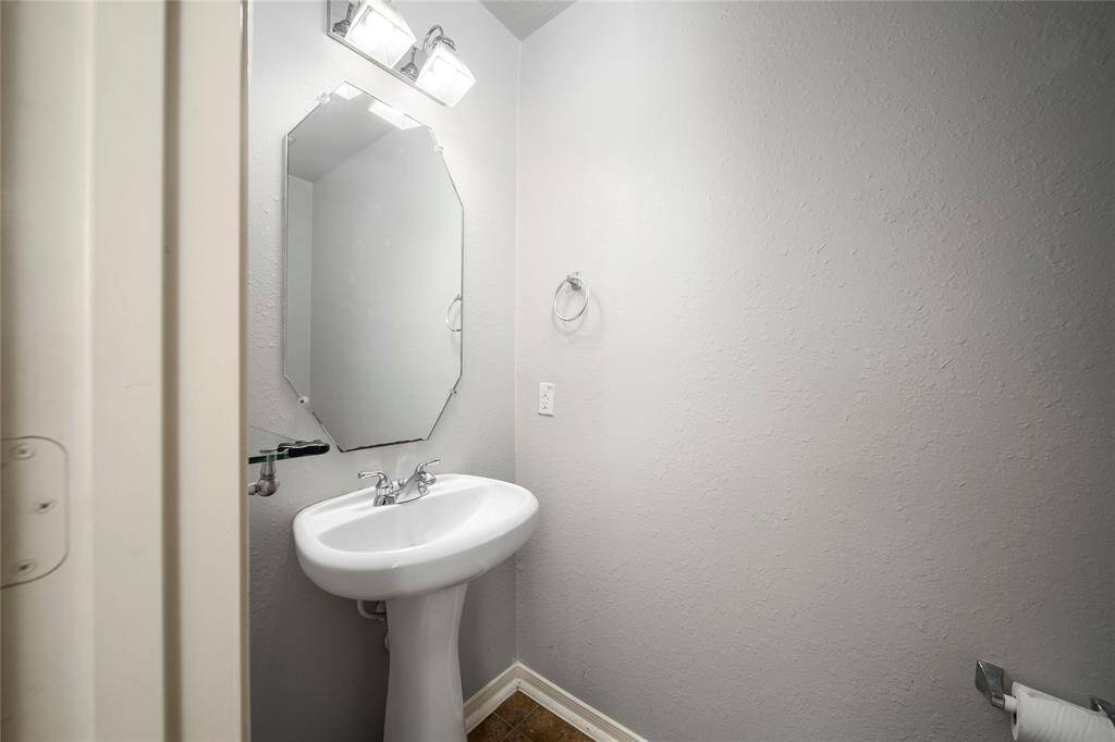 Half bath downstairs next to kitchen